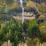Mist Falls waterfall drops 400 feet over rugged basalt cliffs